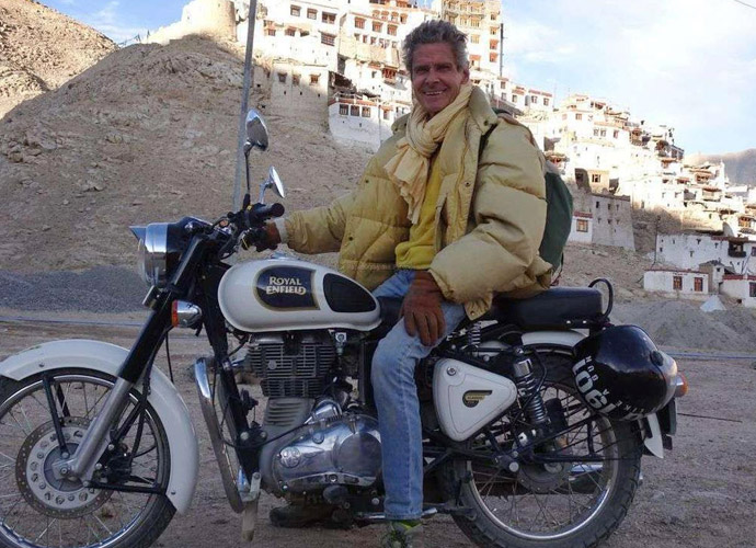 Cosey in Tibet on an Enfield motorcycle